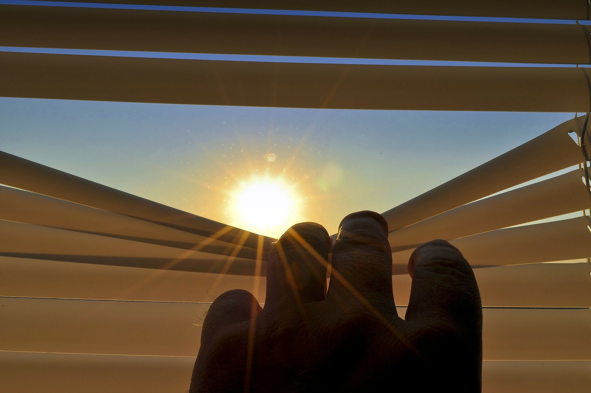 looking at sun through blinds